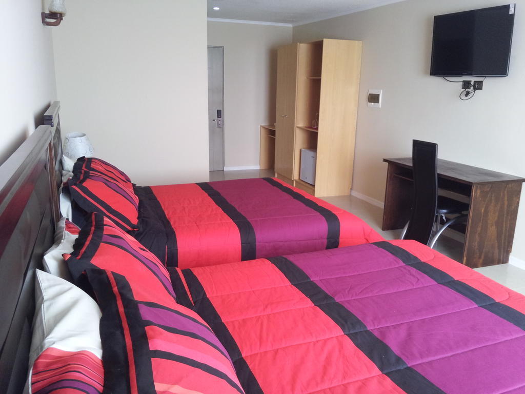 Hotel Astore Suites Antofagasta Quarto foto
