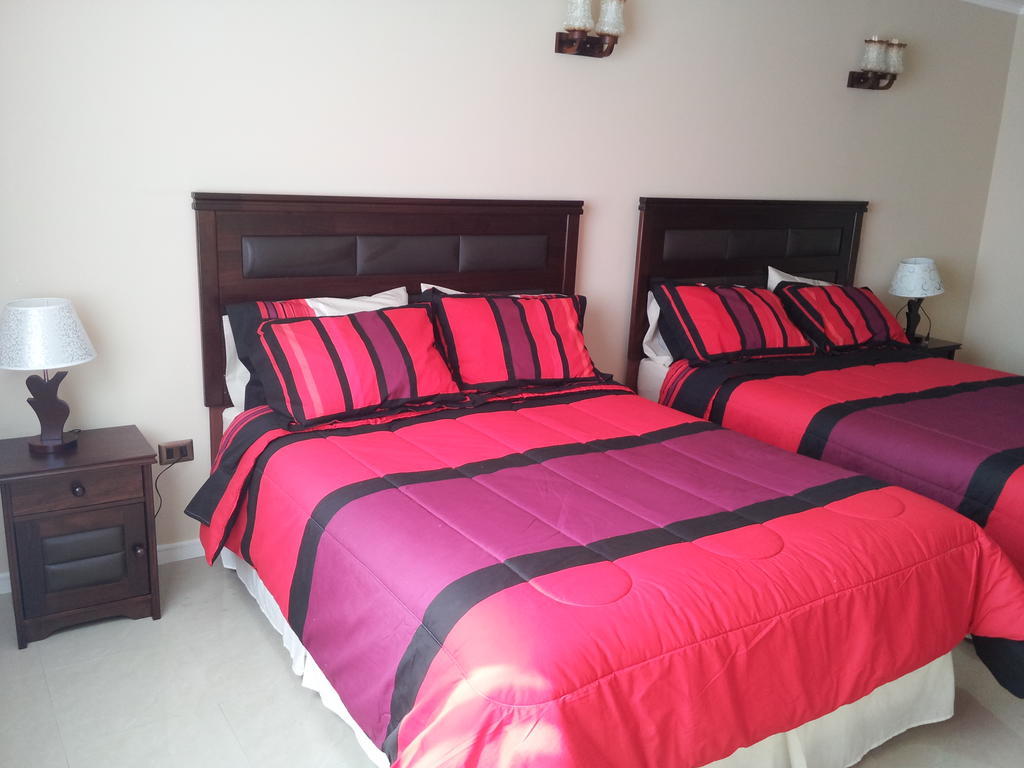 Hotel Astore Suites Antofagasta Quarto foto