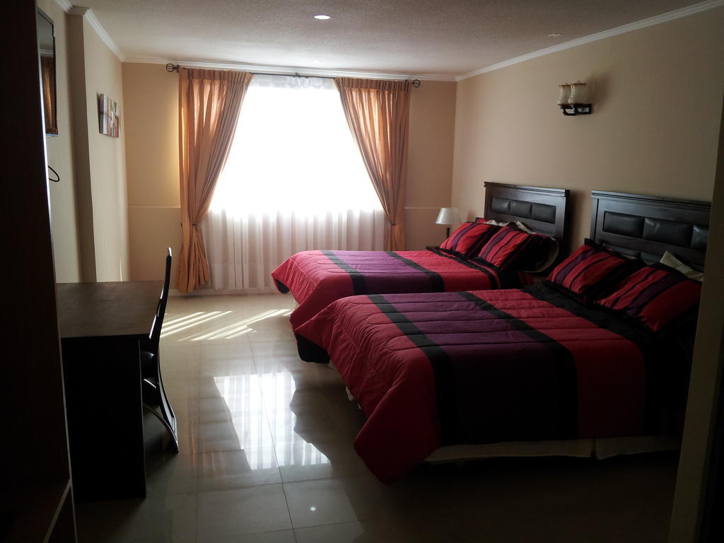 Hotel Astore Suites Antofagasta Quarto foto