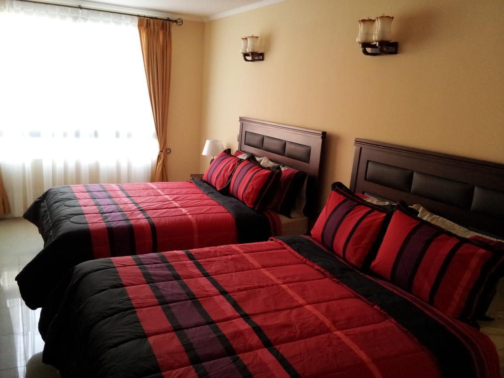 Hotel Astore Suites Antofagasta Quarto foto